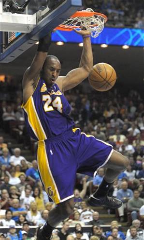 Kobe Bryant Dunking Pictures. Kobe Bryant did a lot of