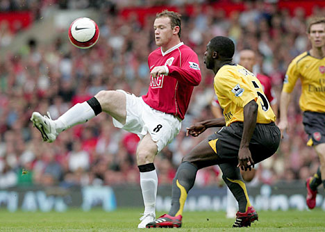 Wayne Rooney and Kolo Toure