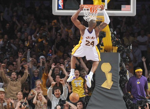 Kobe Bryant Dunk. Kobe Bryant dunking during the
