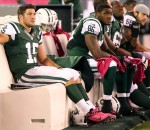 Tim Tebow on the bench
