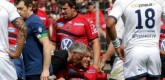 Jonny Wlikinson being helped up after being steamrolled by Fonua