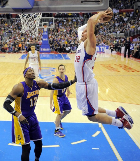 Blake Griffin dunking on Dwight Howard