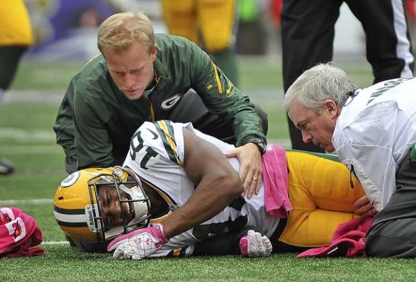 Randall Cobb had to be carted off the field after he was injured by Matt Elam of the Baltimore Ravens