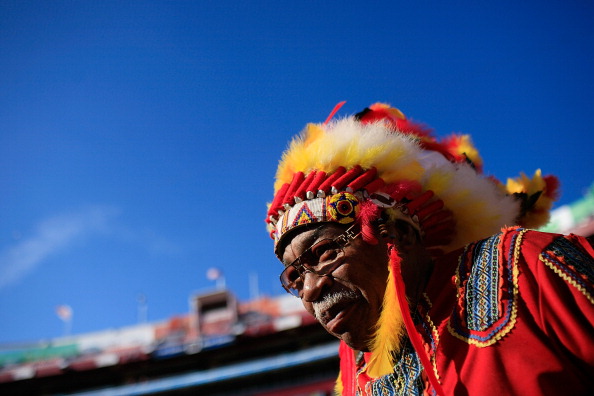 The unofficial mascot of the team is an African American man, Zema Williams (aka Chief Zee), who has attended games since 1978 dressed in a red faux "Indian" costume complete with feathered war bonnet and tomahawk.