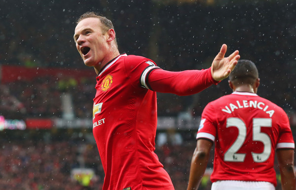 Wayne Rooney celebrating as Manchester United beat Manchester City in the derby 4-2