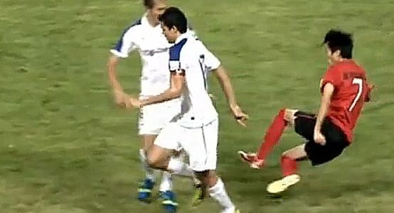 Chinese Player Dangerously Tackles the Wrong Player