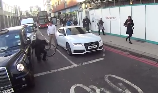 Cyclist Gets Punched in the Face After Chasing a White Audi