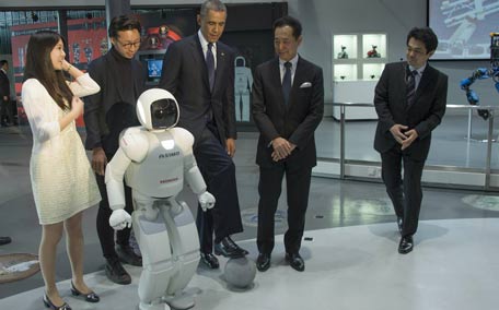 Barack Obama Playing Soccer With a Robot in Japan