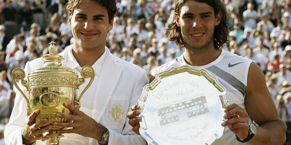 Federer vs Nadal in Grand Slam Finals Over the Years in Photos