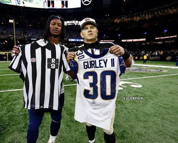 Gurley changing shirts with the ref